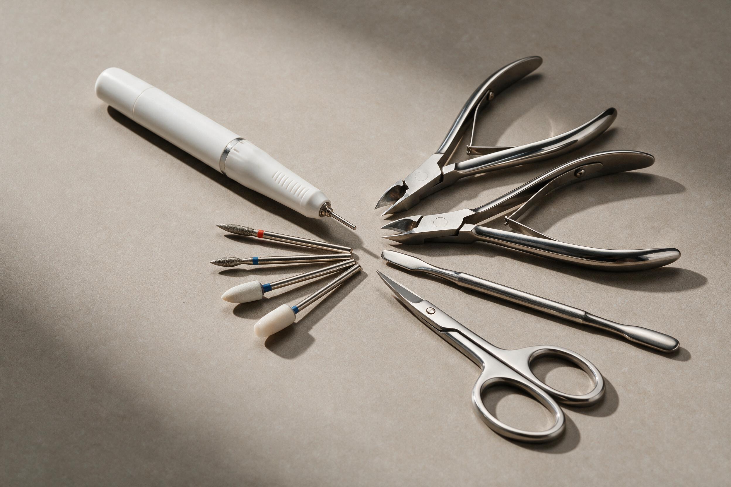 Nail drill bits and steel instruments for the combi manicure course